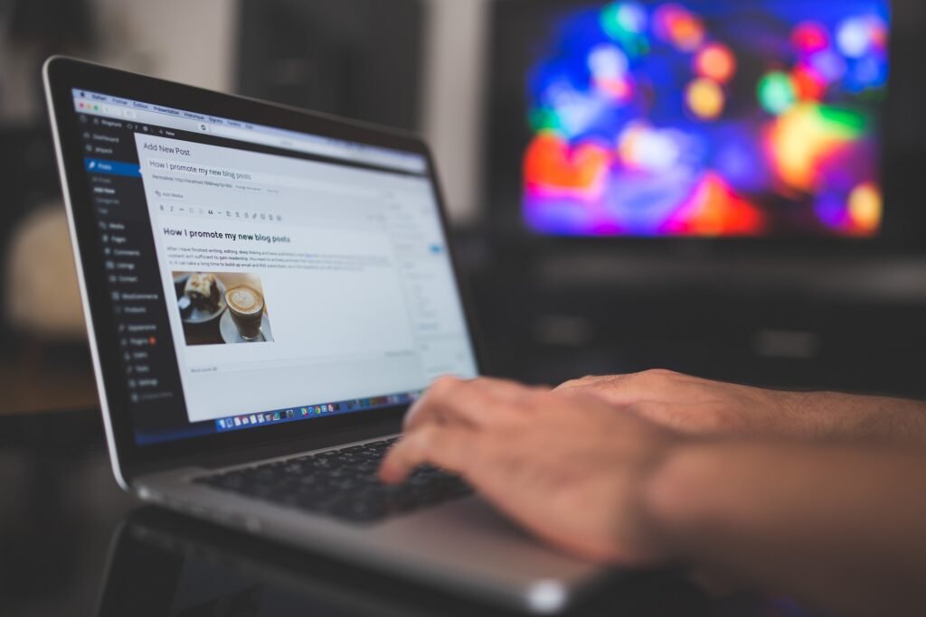 image of a man blogging on his latop