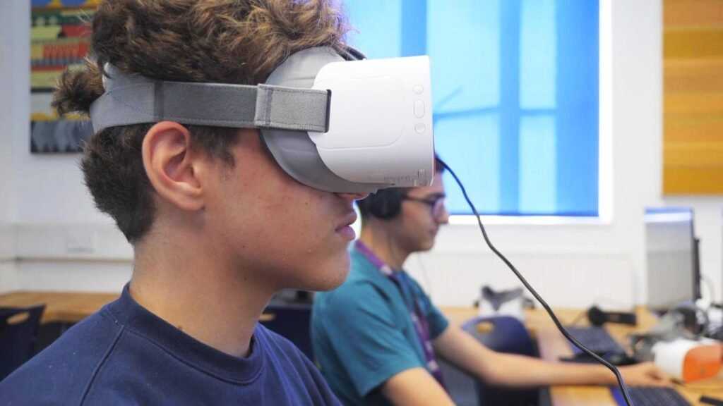 image of school children wearing VR headset, seating in educational lab